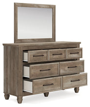 Load image into Gallery viewer, Yarbeck Queen Panel Bed with Mirrored Dresser
